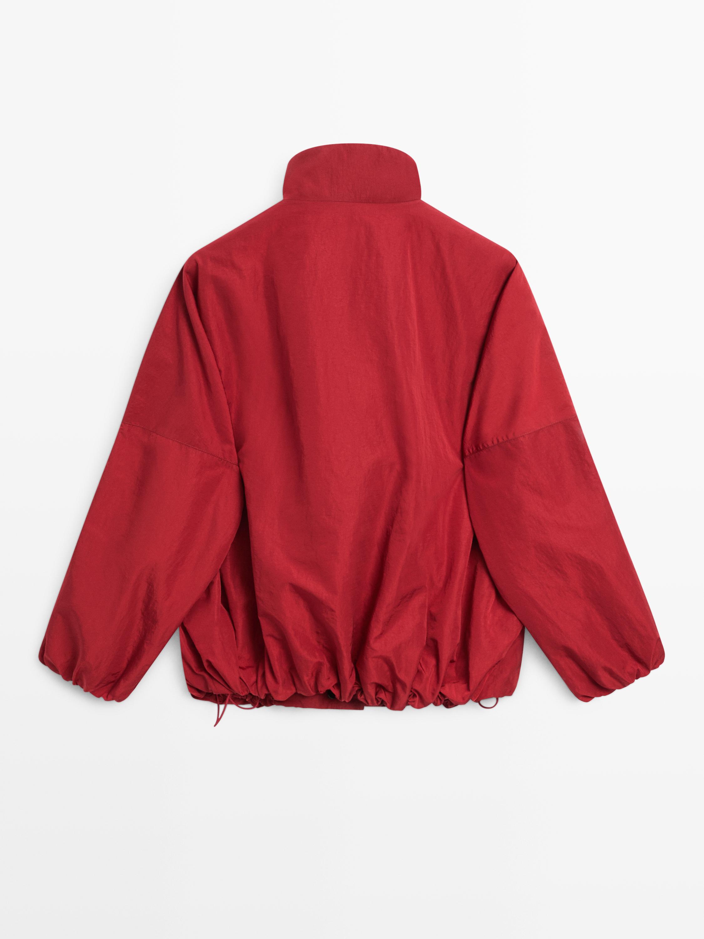 Veste bomber bouffante à col montant